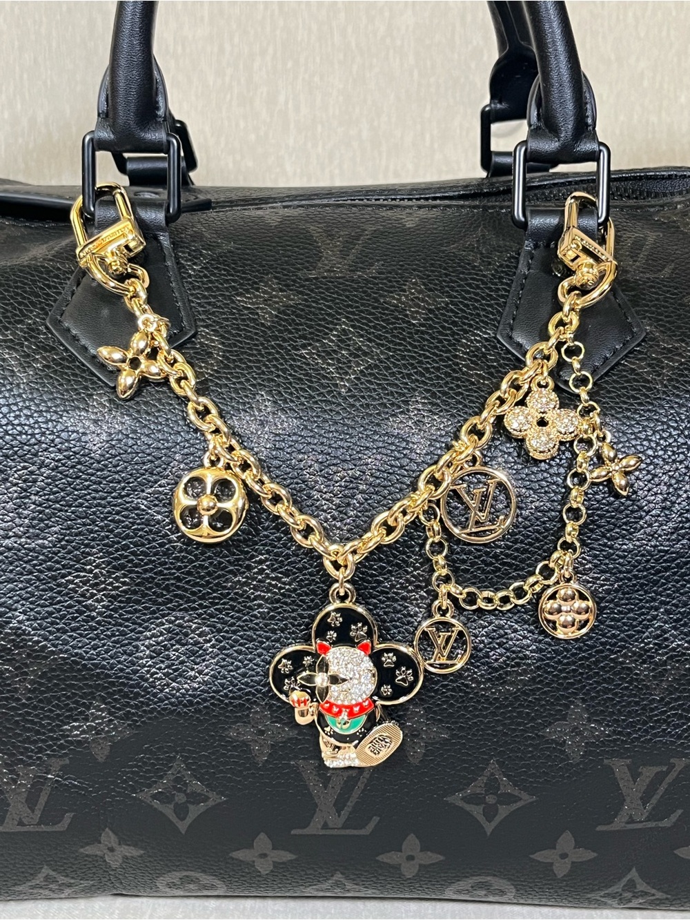 Black Monogram Satchel with Gold Charm Chain and Enamel Accents